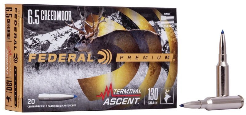 Federal Premium Terminal Ascent 6.5 Creedmoor 130 grain ammunition 20-round box featuring winter mountain background and mule deer illustration, accompanied by two nickel-plated cartridges