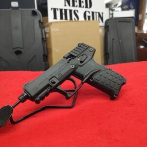 Pre-owned KelTec P17 22LR pistol with threaded barrel on display stand