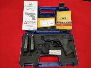 Pre-owned Smith and Wesson MP9c 9mm pistol in blue hard case with 3 magazines