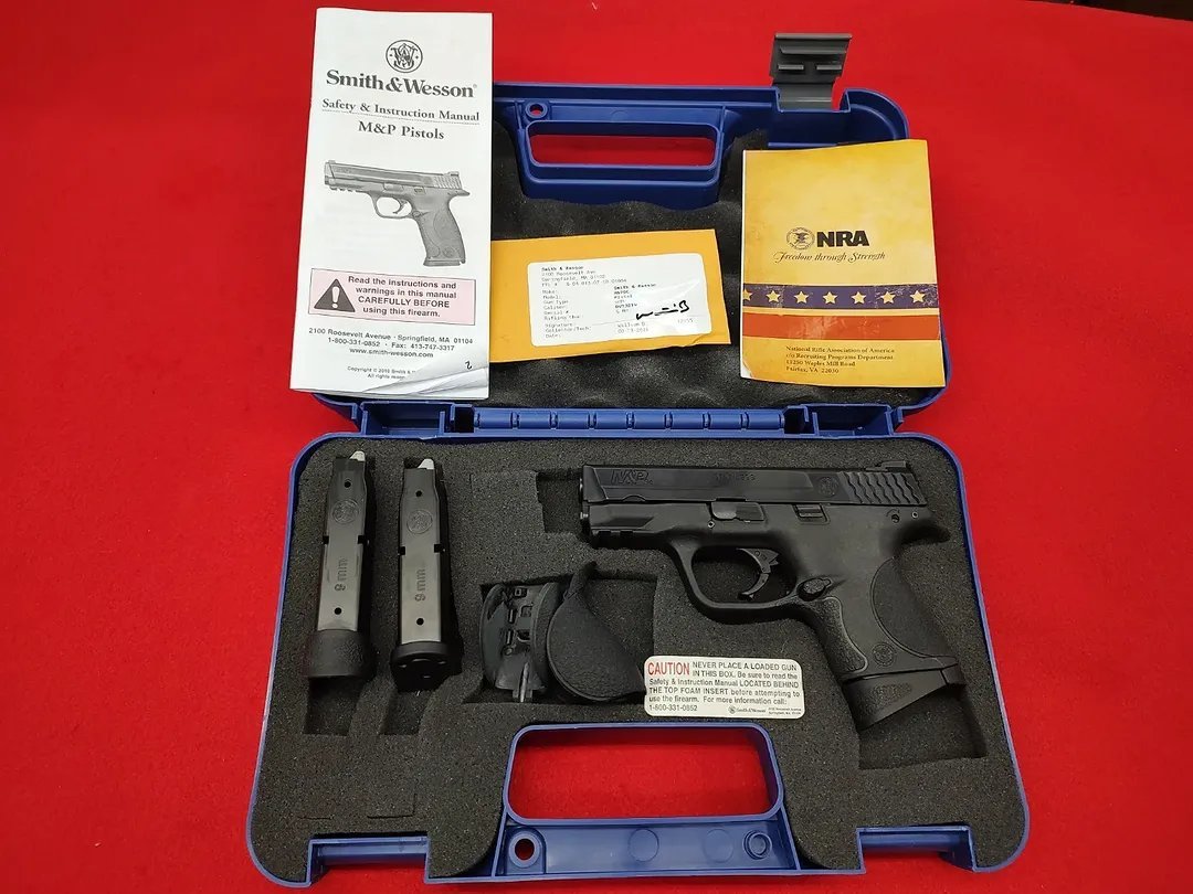 Pre-owned Smith and Wesson MP9c 9mm pistol in blue hard case with 3 magazines