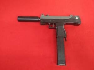 MasterPiece Arms 30TGR Pistol 9mm with fake suppressor barrel extension on red background