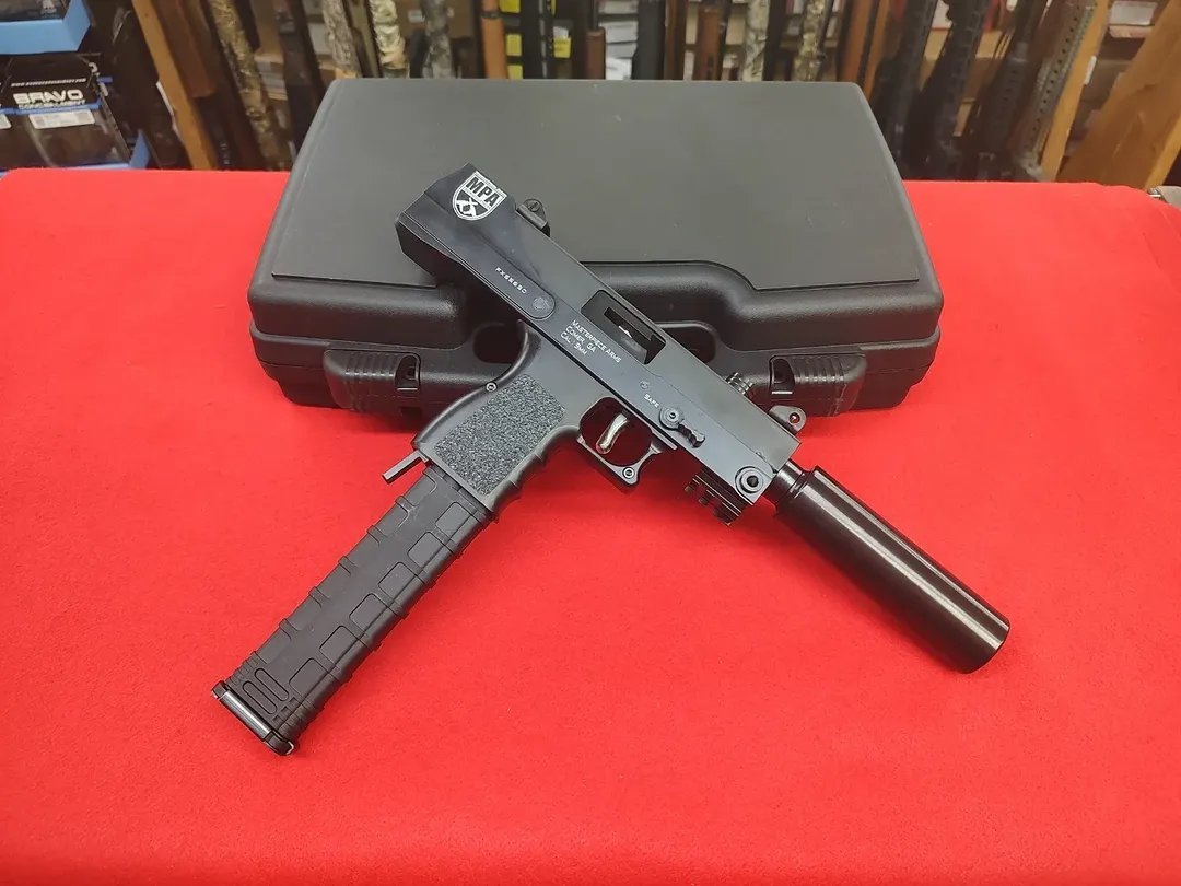 MasterPiece Arms Defender Pistol 9mm with fake suppressor and factory hard case