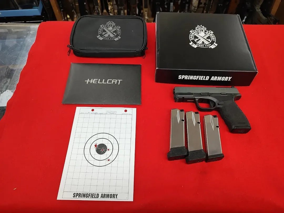 Used Springfield Hellcat Pro 9mm Platinum Gray with 4 mags, factory box, soft case, and target