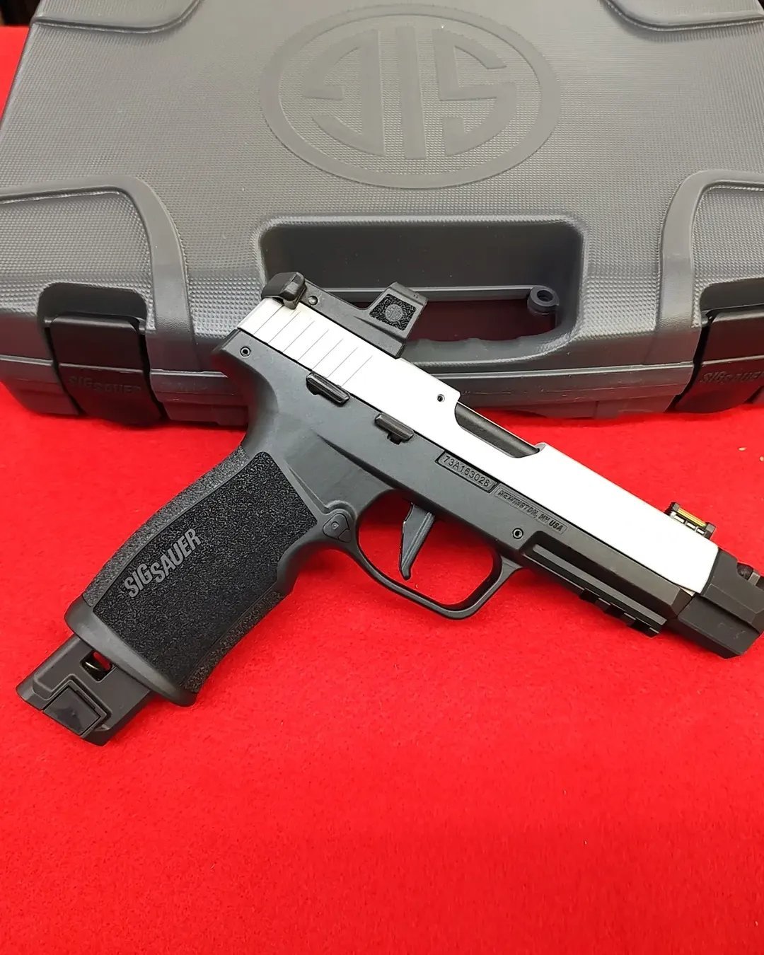 Sig P322 for sale 22 LR handgun with ROMEOZero Elite optic in front of factory case