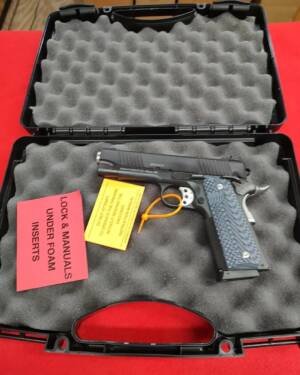 Magnum Research DE1911C 45 ACP pistol with G10 grips in open hard case near me