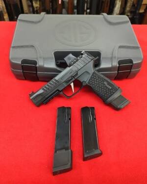 Sig P365 Fuse online 9mm pistol with Romeo-X optic and magazines resting in front of hard case near me