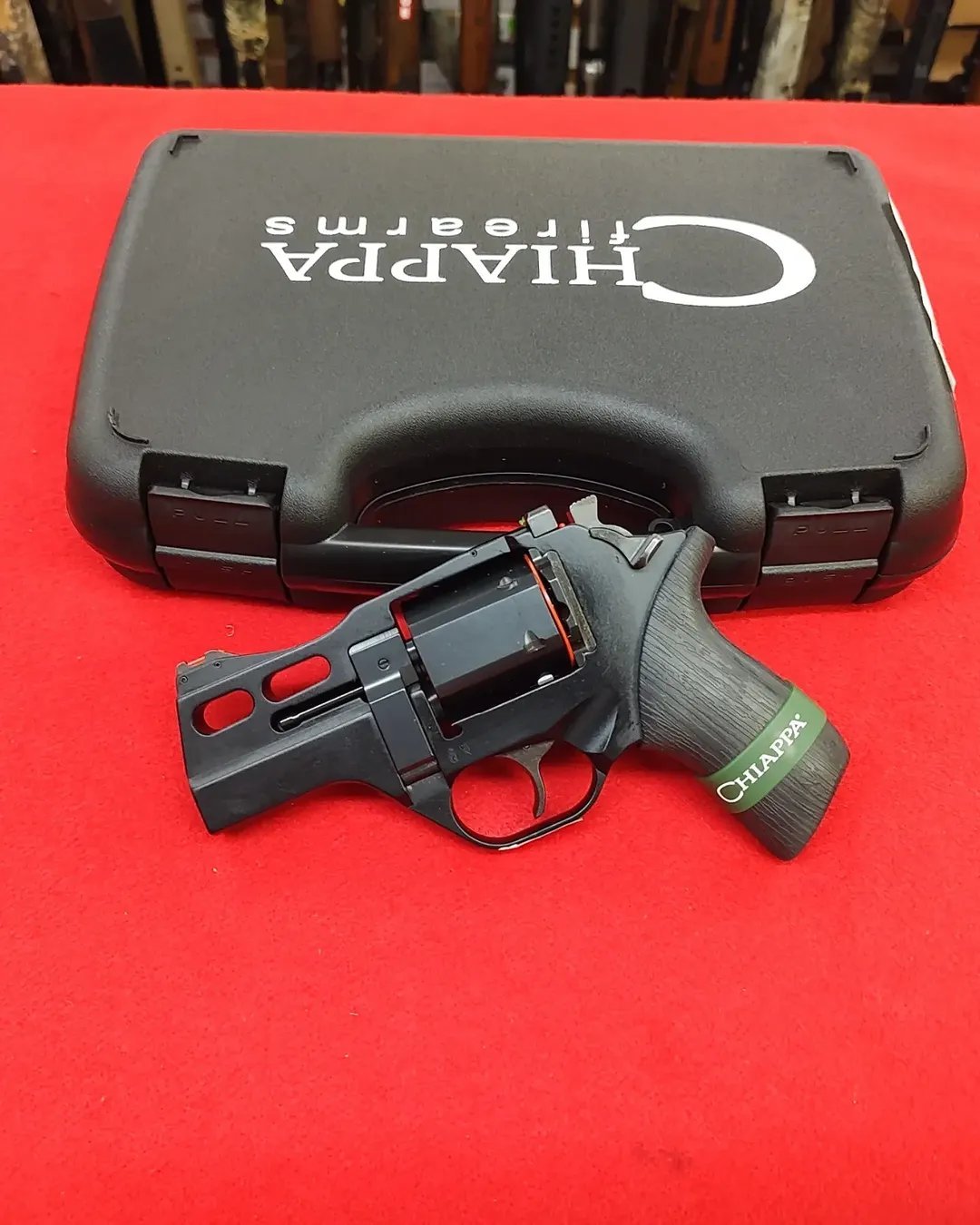 Chiappa Rhino 30DS 357 Magnum revolver resting in front of black factory hard case near me