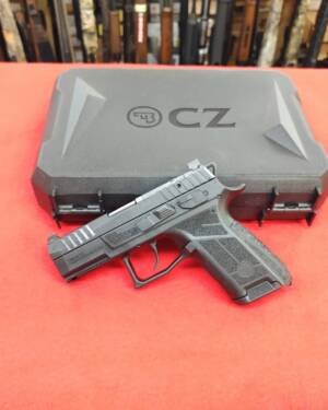CZ P-09 C Nocturne 9mm compact pistol resting in front of black factory hard case near me