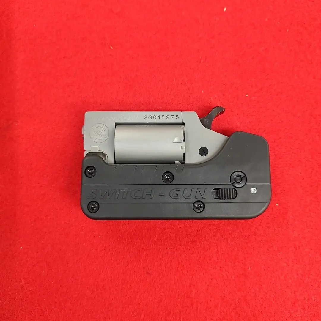 Standard Manufacturing Switch Gun silver 22 Mag folding revolver closed profile near me